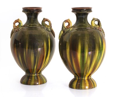 Lot 104 - A pair of pottery vases, possibly Burmantofts