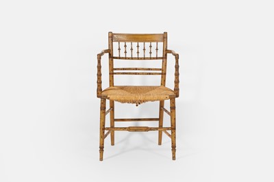 Lot 188 - A Regency painted faux bamboo elbow chair
