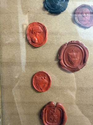 Lot 87 - A framed group of wax seals