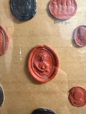 Lot 87 - A framed group of wax seals