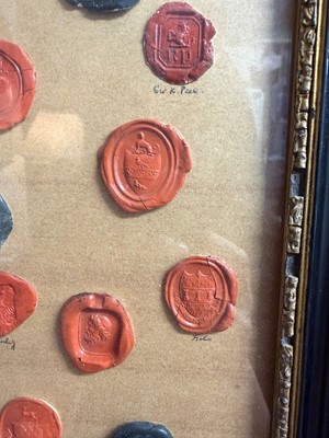 Lot 87 - A framed group of wax seals