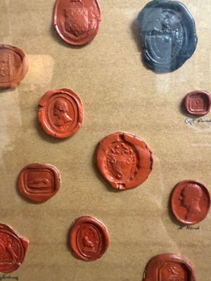 Lot 87 - A framed group of wax seals
