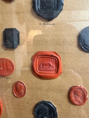 Lot 87 - A framed group of wax seals