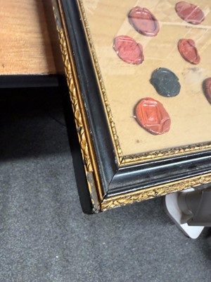 Lot 87 - A framed group of wax seals