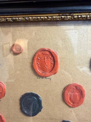 Lot 87 - A framed group of wax seals