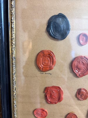 Lot 87 - A framed group of wax seals