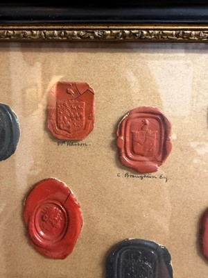 Lot 87 - A framed group of wax seals