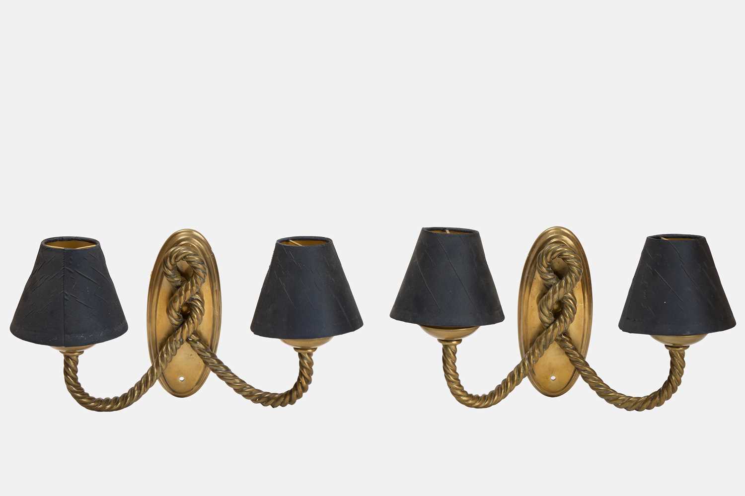 Lot 52 - A pair of brass wall lights by Besselink & Jones