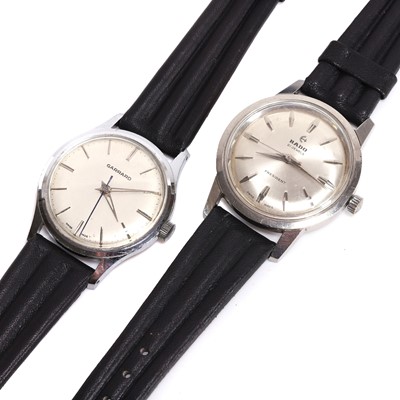 Lot 472 - A stainless steel Garrard mechanical watch and a stainless steel Rado President mechanical watch