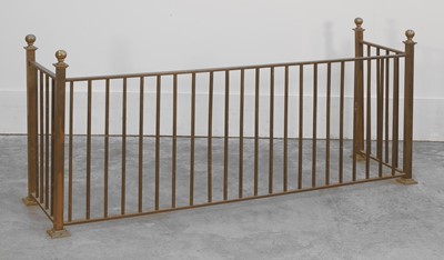 Lot 549 - A low brass fire fender