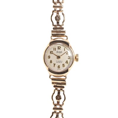 Lot 447 - A ladies' 9ct gold mechanical bracelet watch