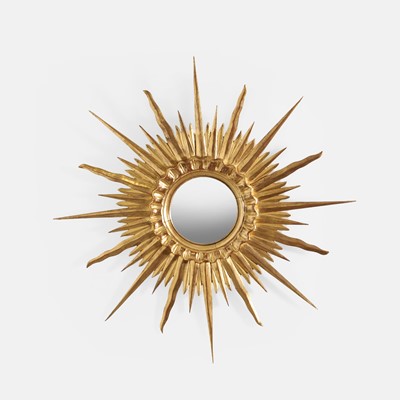 Lot 356 - A French giltwood and gesso sunburst wall mirror