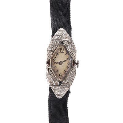 Lot 446 - A diamond set cocktail strap watch