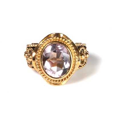 Lot 61 - A Portuguese gold amethyst single stone ring