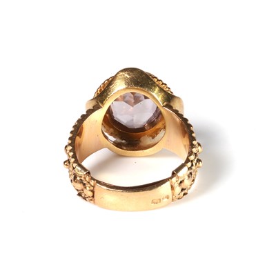 Lot 61 - A Portuguese gold amethyst single stone ring