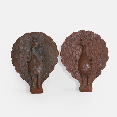 Lot 361 - A pair of peacock wood plaques or wall appliqués