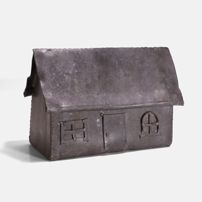 Lot 380 - A folk art lead model of a house