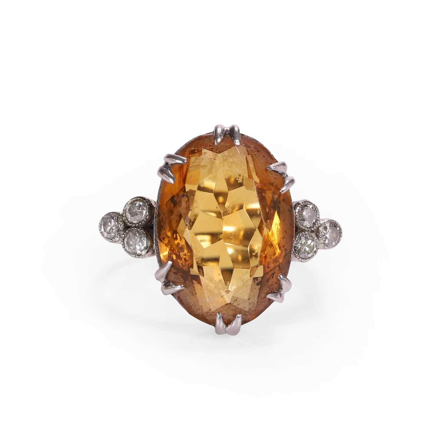 Lot 62 - A citrine and diamond ring