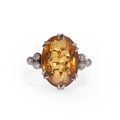 Lot 62 - A citrine and diamond ring