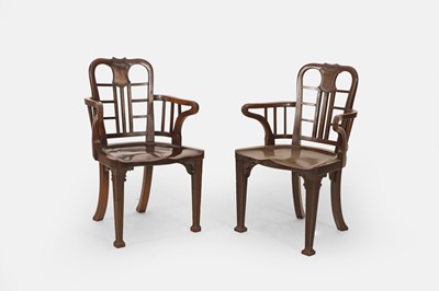 Lot 57 - A pair of George II-style mahogany hall chairs