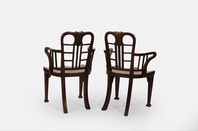 Lot 57 - A pair of George II-style mahogany hall chairs