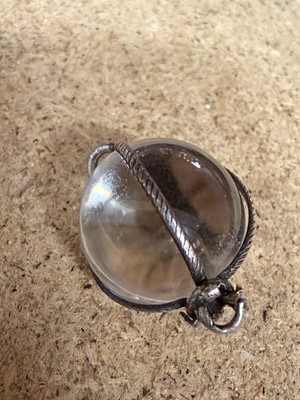 Lot 5 - A mystical quartz orb pendant