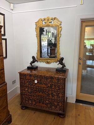 Lot 60 - A George II carved giltwood and gesso pier mirror