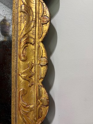 Lot 60 - A George II carved giltwood and gesso pier mirror