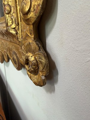 Lot 60 - A George II carved giltwood and gesso pier mirror