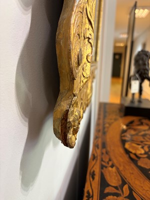 Lot 60 - A George II carved giltwood and gesso pier mirror