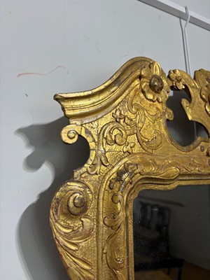 Lot 60 - A George II carved giltwood and gesso pier mirror