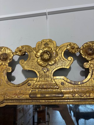 Lot 60 - A George II carved giltwood and gesso pier mirror