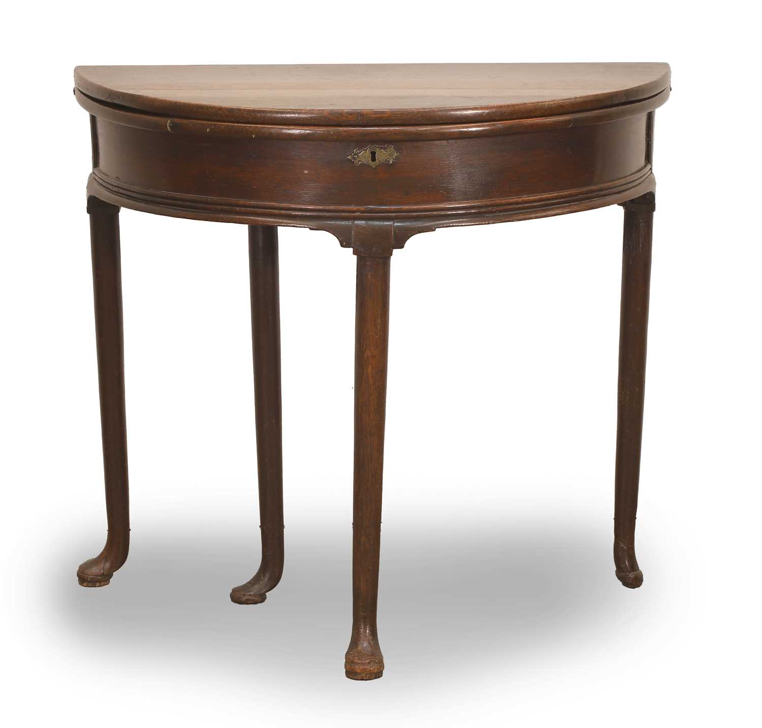 Lot 523 - A George II oak games table