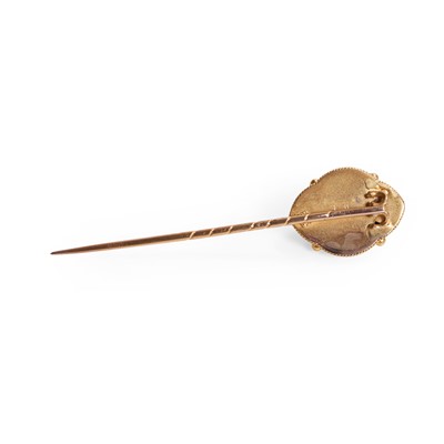 Lot 8 - A Victorian Etruscan Revival split pearl and enamel stick pin