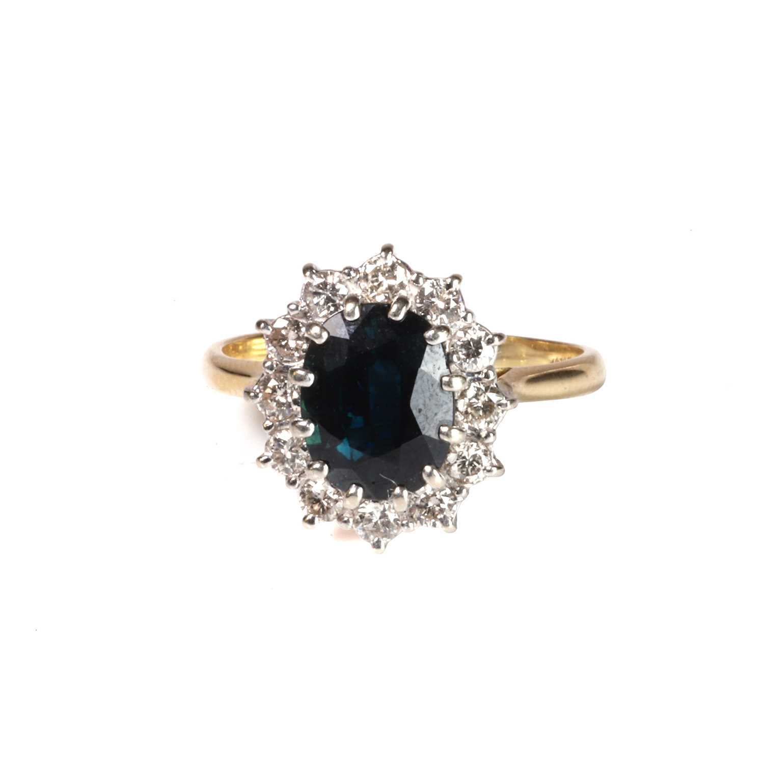 Lot 83 - An 18ct gold sapphire and diamond ring