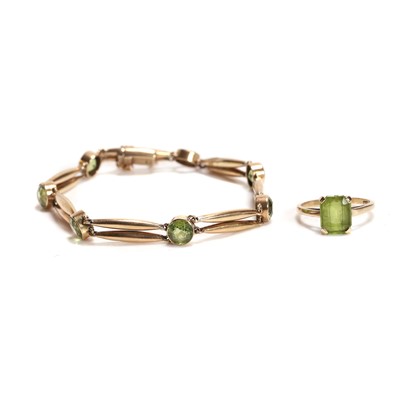 Lot 234 - A peridot bracelet and a peridot single stone ring