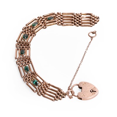 Lot 340 - A 9ct gold paste set gate bracelet