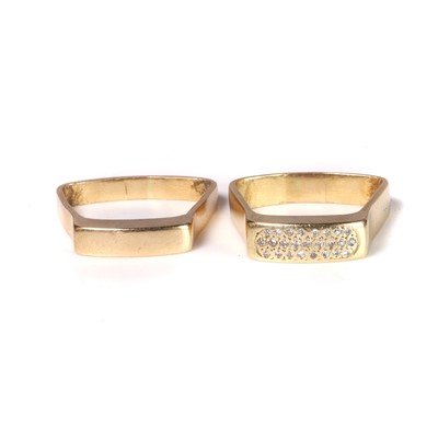 Lot 247 - An 18ct gold diamond ring and a matching band ring