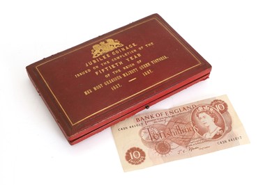 Lot 7 - A tooled leather case marked 'Jubilee Coinage 1837-1887'