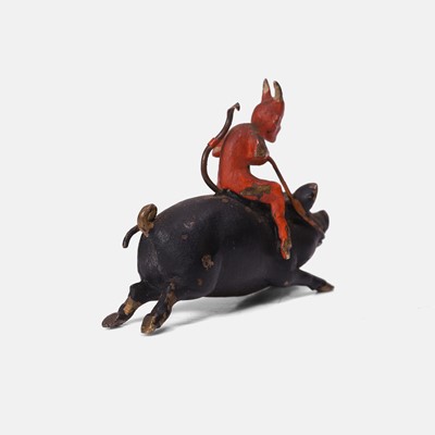 Lot 91 - A novelty Austrian cold-painted devil on a pig figure