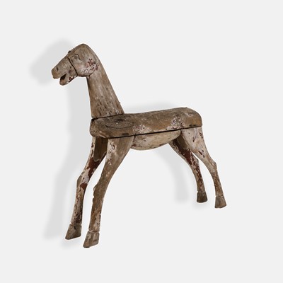 Lot 142 - A carved wood horse