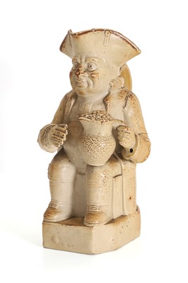 Lot 105 - A Staffordshire salt glazed stoneware Toby jug