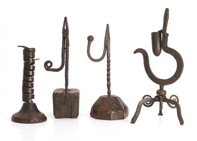 Lot 304 - A group of four wrought iron lighting devices