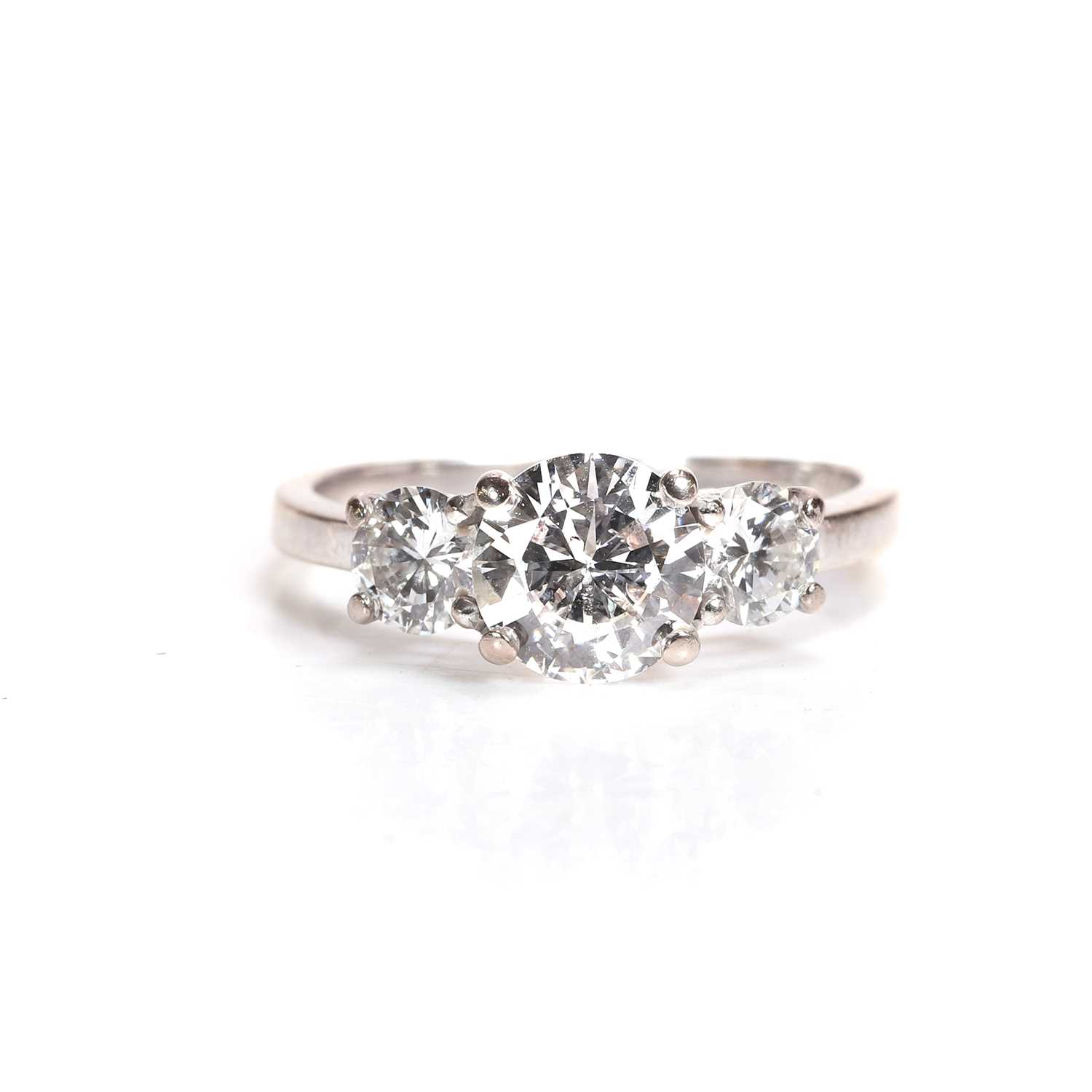 Lot 74 - A diamond three stone ring