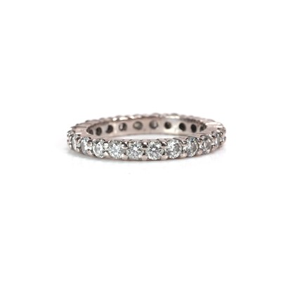 Lot 150 - An 18ct white gold diamond full eternity ring
