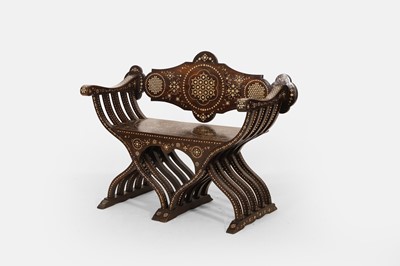 Lot 329 - A Damascus-style walnut and bone-inlaid Savonarola settee