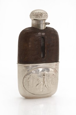 Lot 9 - Golfing Interest, a silver-plated hip flask