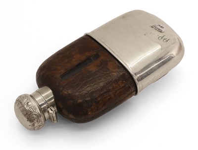 Lot 9 - Golfing Interest, a silver-plated hip flask