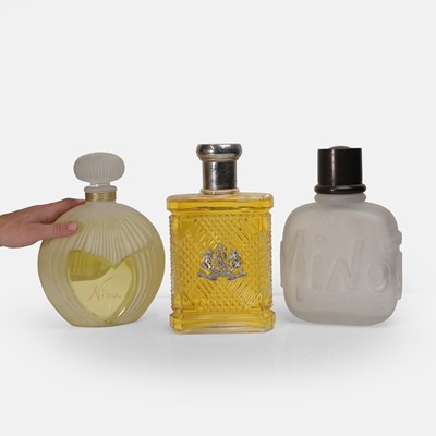 Lot 423 - Three oversized glass perfume and aftershave advertising bottles