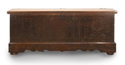 Lot 521 - A carved wooden chest